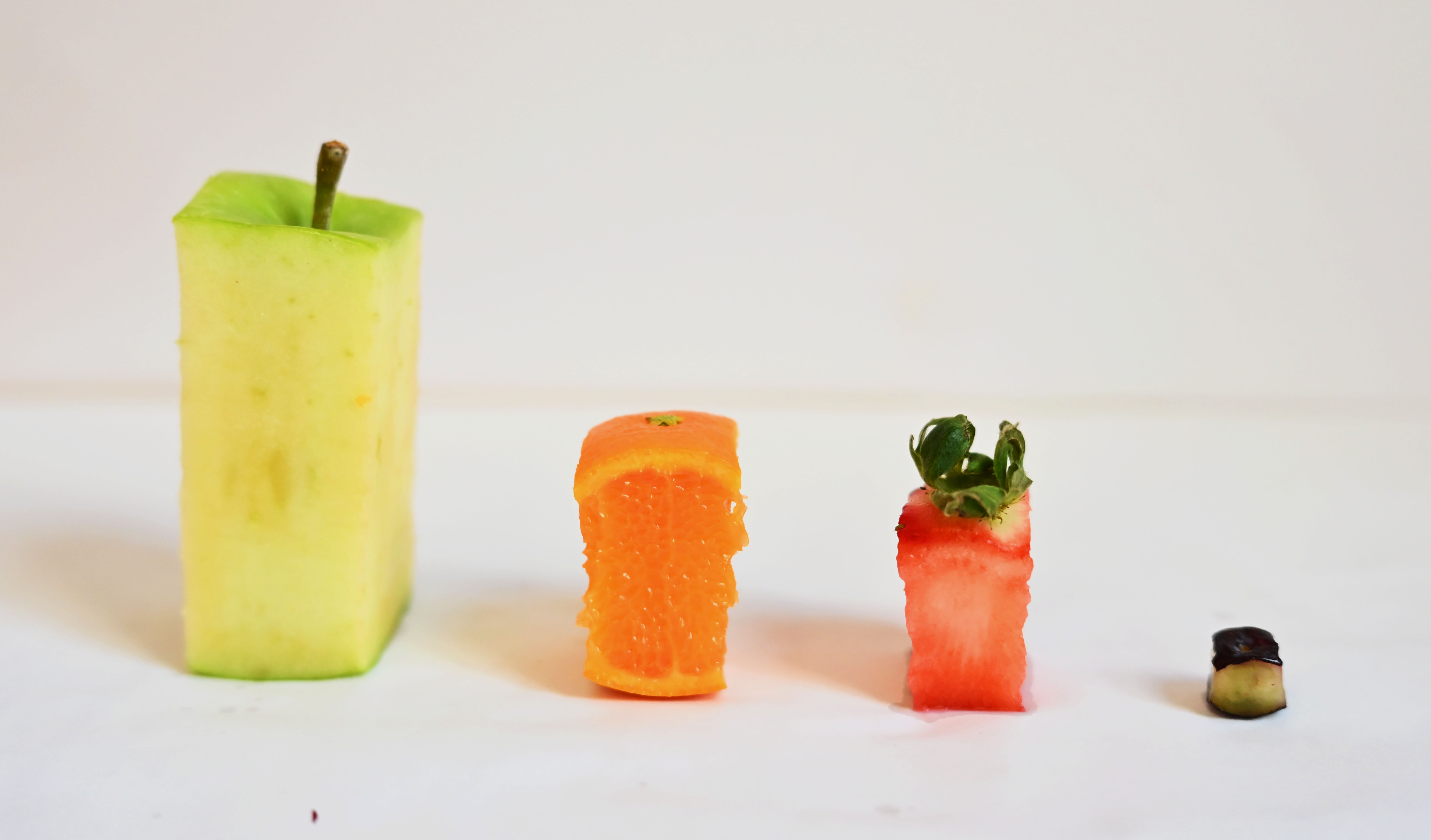 Fruits carved into geometric forms
